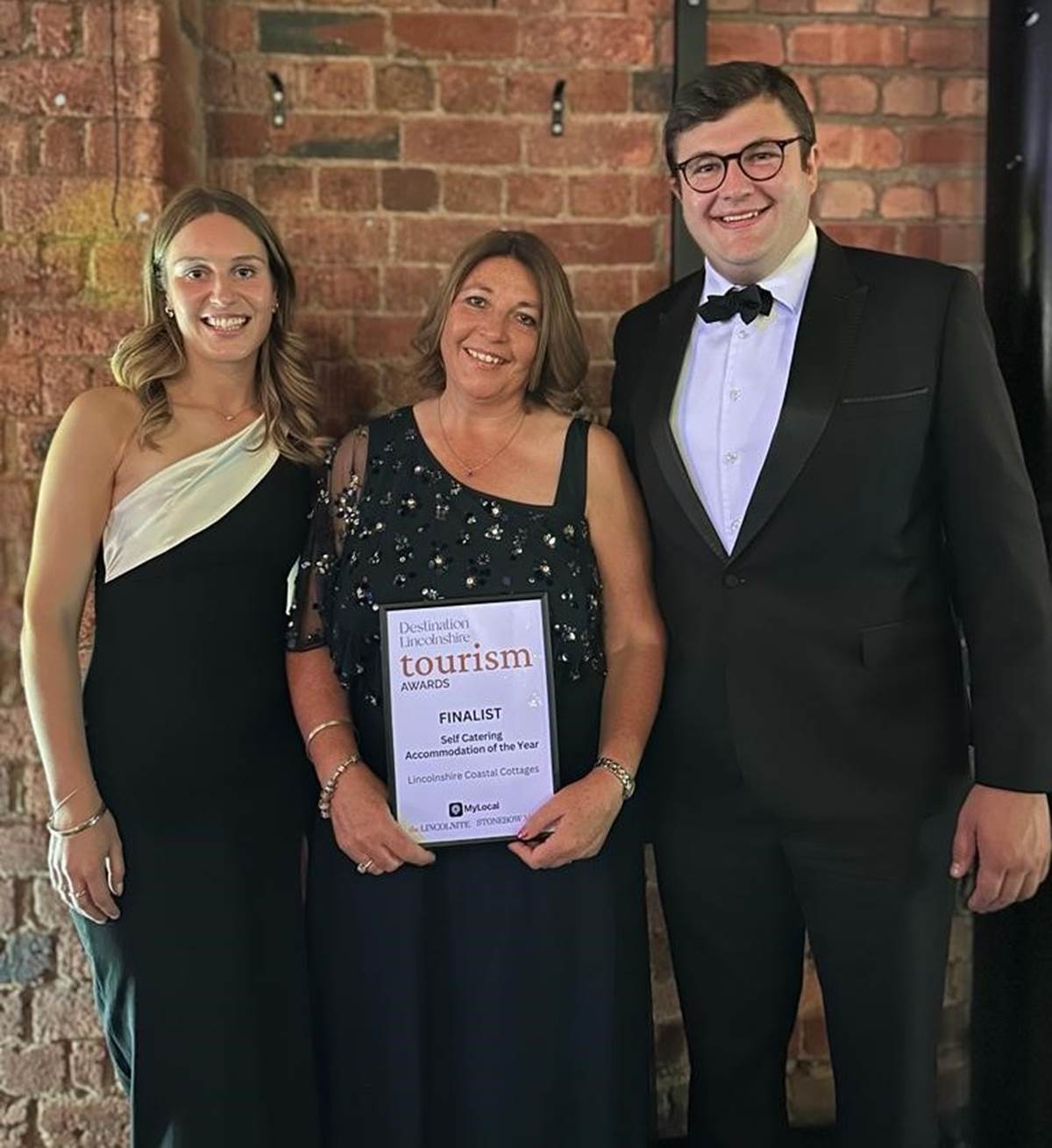 Pictured are finalists, Sue and Lorna Bowser from Lincolnshire Coastal Cottages and Chris Sheldon of Brown&Co at the awards night.