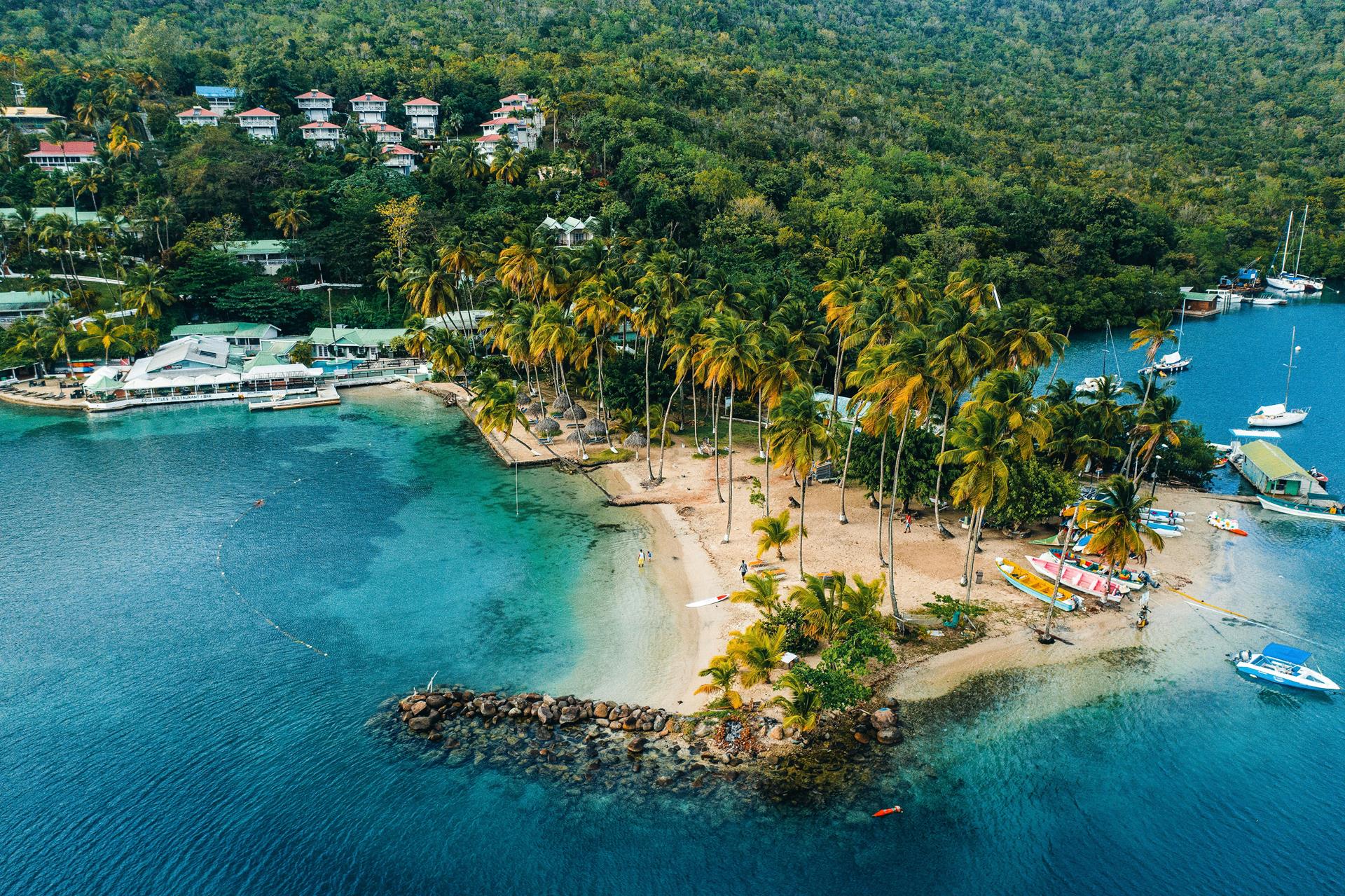What's the process of buying a 'slice of paradise' in St Lucia?
