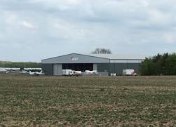 Architect returns to view progress on airfield hangar