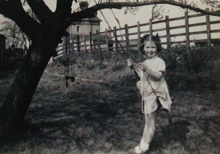 Liz Hunt as a child in the garden of Station House.