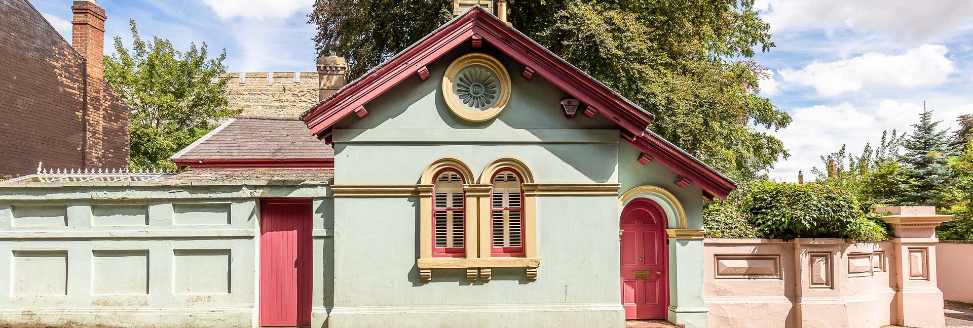 Ornate gatehouse home designed for famous artist for sale