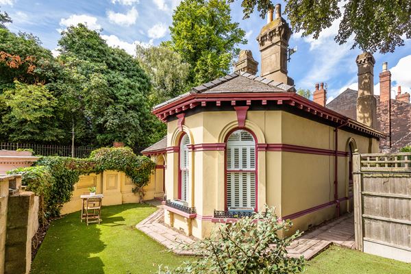 Ornate gatehouse home designed for famous artist for sale